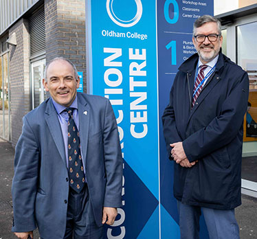 (L-R) Robert Halfon, Minister of State for Education, is welcomed by Alun Francis, Interim Chair of the Social Mobility Commission to Oldham College’s flagship new £9m Construction Centre for T Level learners. (February 8, 2023)