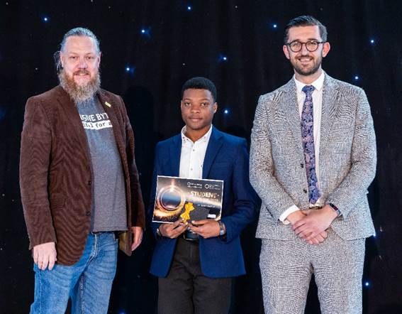 Award winners holding certificates