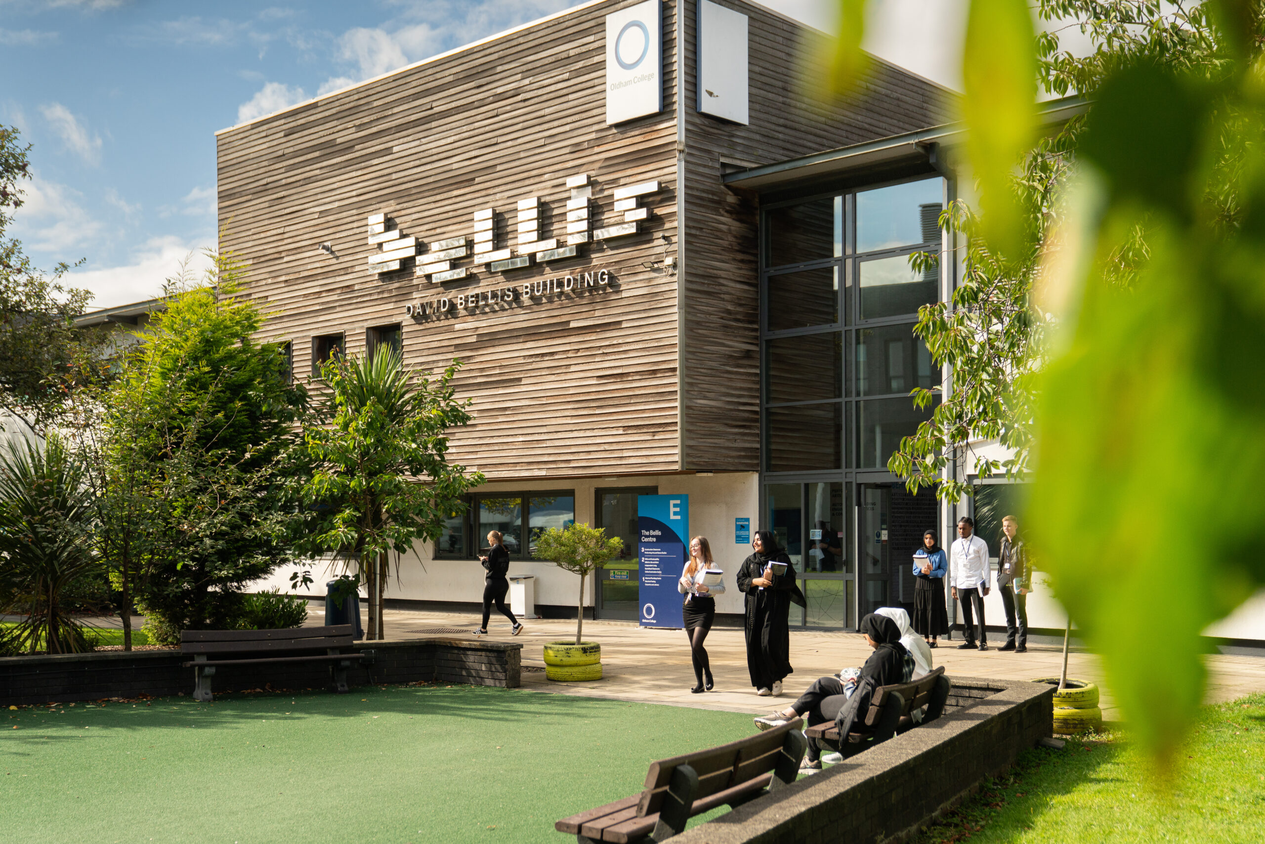 External view of a college building with trees