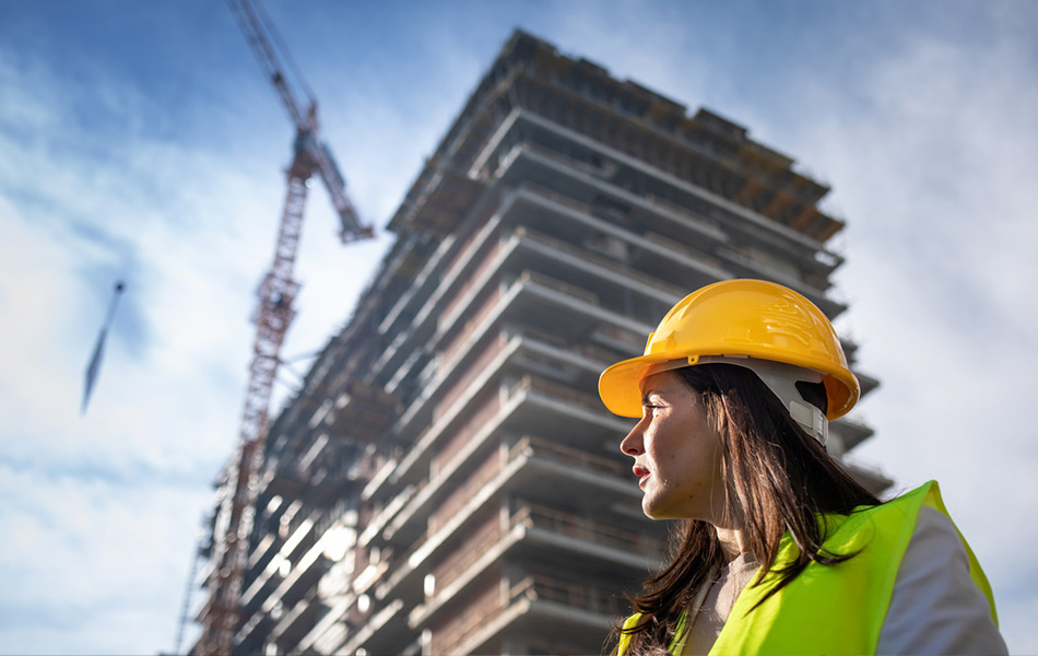 Woman in front of building site