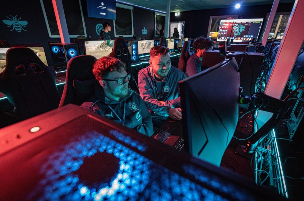 Students and a tutor in the Esports suite.